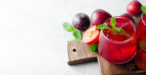 Plum Lemonade, Refreshing Drink, Cocktail, Iced Tea, Plum Summer Drink on Bright Background