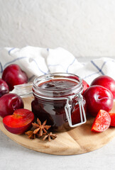 Plum Jam in a Jar, Delicious Homemade Plum Jam on Bright Background