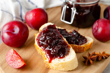 Bread Toasts with Plum Jam, Delicious Homemade Plum Jam on Bright Background