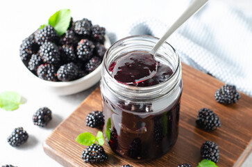 Blackberry Jam in a Jar, Delicious Homemade Berry Jam on Bright Background