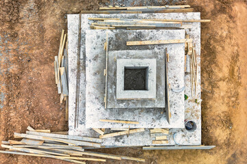 Monolithic reinforced concrete foundations for the construction of a large building. Rostverk at the construction site. Construction pit with foundation. close-up. View from above.