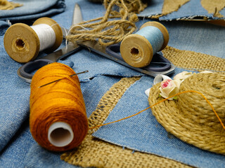 Handmade crafts from old blue denim and sewing accessories, recycling items of clothing