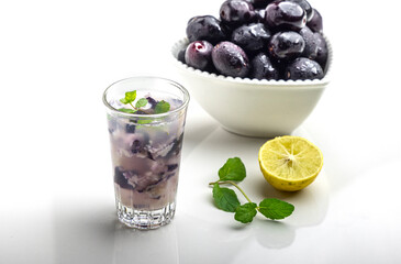 Refreshing Black Plum Mojito: Muddled Delight with Lemon and Mint