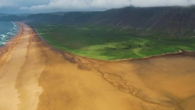 Aerial view of Radisandur coastline with sand, Westfjords, Iceland.