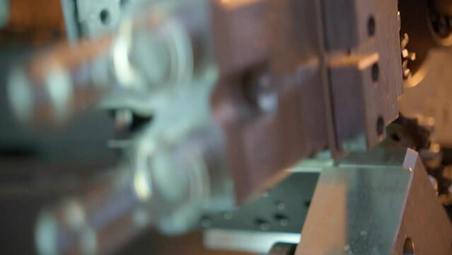 Raw shape of plastic water bottle on conveyor