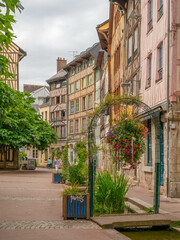 Fototapeta na wymiar The rue eau de robec, one of the most scenic and picturesque street in the historic center of Rouen, Normandy, France