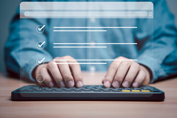 Businessman using computer keyboard to tick correct sign mark in checkbox for quality document...