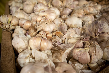 Garlic on display at a market stall 
