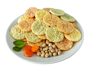 Chickpea chips snack with vegetables on a plate on a white background