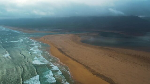 Aerial view of Radisandur coastline with sand, Westfjords, Iceland.