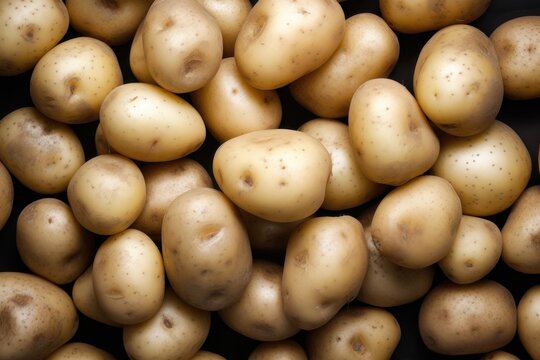 Fresh potato seamless background, adorned with glistening droplets of water. AI generated
