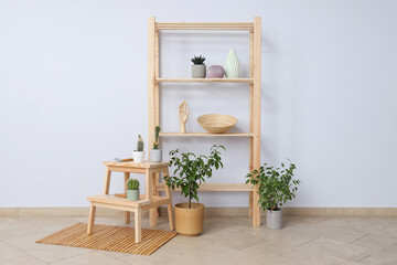 A shelf with flowers, a rack in the interior