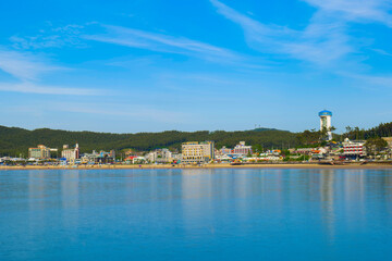 Naklejka premium view of the coastal city beach in the summer. Mallipo beach Taean gun city in South Korea 26.06.2023