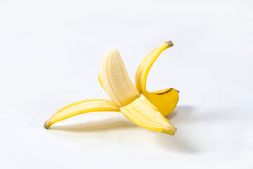 Peeled banana isolated on white background
