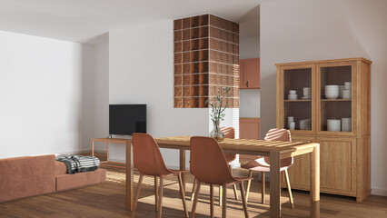 Modern scandinavian dining and living room in white and orange tones. Wooden table with chairs, glass block wall. Cabinets and sofa. Minimal interior design