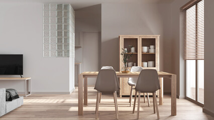 Scandinavian dining and living room in white tones. Bleached wooden table with chairs, glass block wall. Cabinets and sofa. Japandi interior design