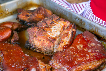 Roast pork in a Picanteria, traditional restaurant in the city of Arequipa in Peru.