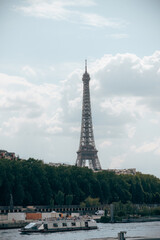 Fototapeta na wymiar Eiffel Tower over beautiful blue cloud sky Paris France