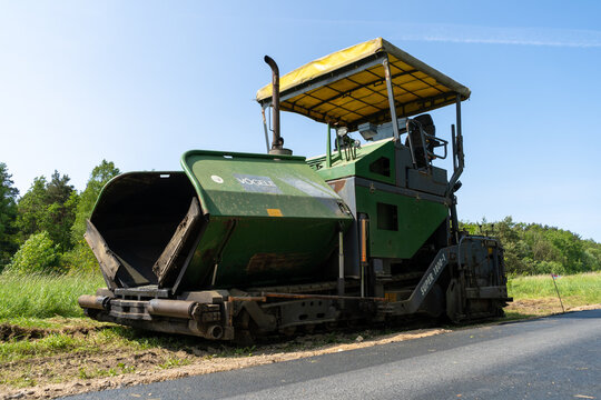 V&ouml;gele Super 1800-1. Paver finisher equipment. Crawler paving machine for laying asphalt on June 3, 2023 in Tenczynek, Poland.