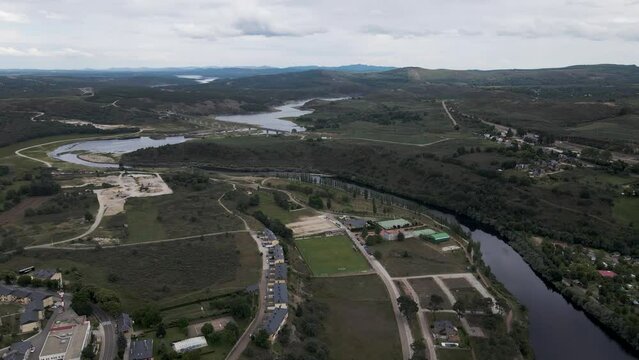 Aerial view of Rio Tera river crossing Puebla de Sanabria in Zamora, Spain.