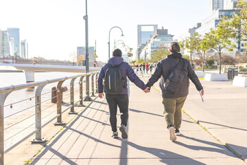 Tourist gay couple exploring Puerto Madero, Buenos Aires, Argentina