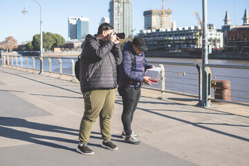 Couple of friends exploring Puerto Madero, Buenos Aires, Argentina