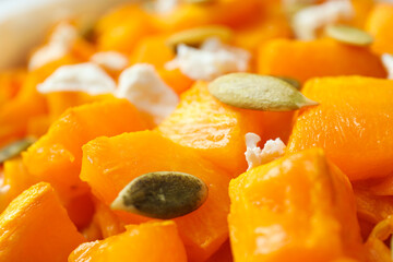 Concept of tasty homemade dish - baked pumpkin