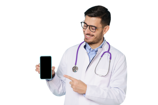 Young doctor in white robe and glasses, showing commercial offer on blank phone screen, pointing, smiling