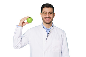 Smiling nutritionist or dentist doctor wearing white coat and round glasses, showing green apple...