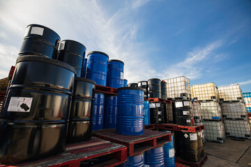 Barrels stock chemical products The metal barrels are blue. Chemistry. Manufacture of chemicals. - obrazy, fototapety, plakaty
