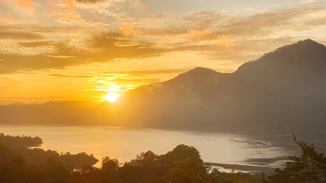 Stunning view on mount Abang  and lake Batur at sunrise
