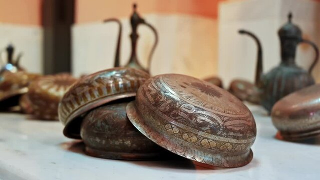 Close view of vintage painted dishes in hamam museum in Istanbul, Turkey.