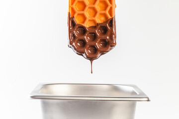 Waffles on a white table. Fresh waffles breakfast, Belgian Waffles snack with dripped Assorted Sweet on white background.