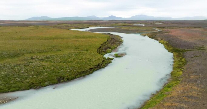Aerial view of winding river Sanda in the desolate highlands of Iceland.