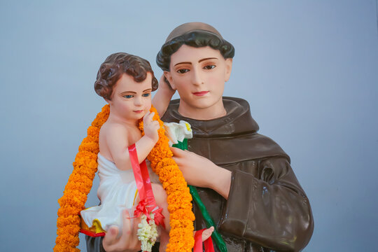 Saint Anthony holding Child Jesus Catholic religious statue