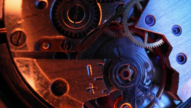 Old vintage clock gears, cogs mechanism. Macro internal structure of watch.