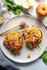 Toasts with peanut butter, apples and honey. Healthy breakfast food or snack.