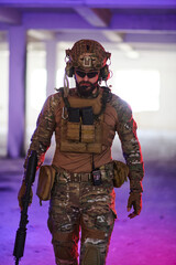 A professional soldier undertakes a perilous mission in an abandoned building illuminated by neon blue and purple lights