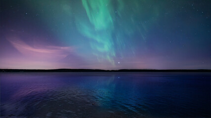 Fototapeta na wymiar Northern Lights shot in the summer time by the lake
