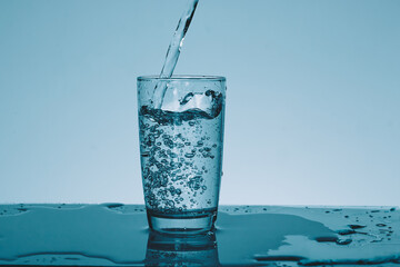 fresh water being poured into glass