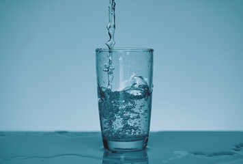 fresh water being poured into glass