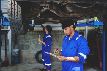 Mechanic inspects and maintains the engine for the customer. An app to write checklists for repair...
