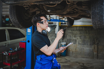 Mechanic inspects and maintains the engine for the customer. An app to write checklists for repair...