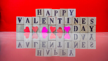 Happy valentine day on wooden blocks