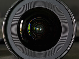 Camera lens on black background. Aperture blades. Camera lens close up