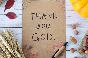 Thank You God, handwritten message on vintage paper with autumn leaves, pumpkin, and ripe wheat...