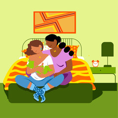 Everyday LGBT Life -. LGBT Moms Embracing in Bed, Breastfeeding Their Newborn Baby