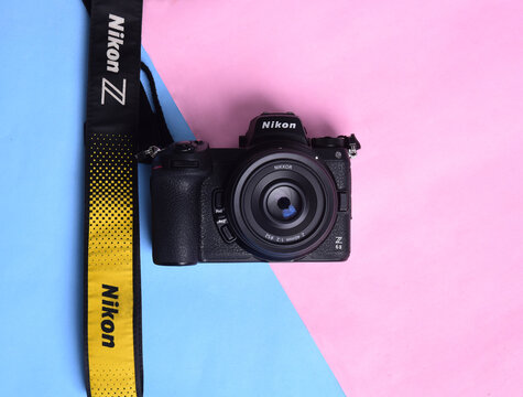 Goiania Nikon Z6 II (version 2) camera photograph confrontation and competition between cameras. color background. The best mirrorless cameras from top brands.