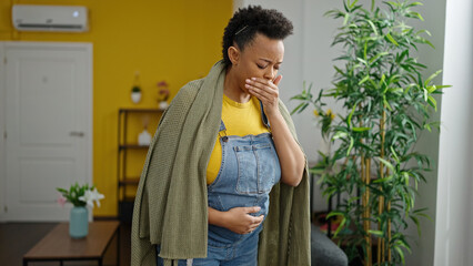 Young pregnant woman being sick for nausea at home
