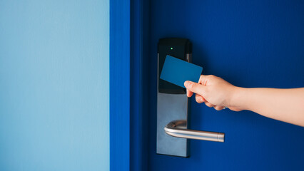 Electronic card key for open door in hotel. Smart card key to lock and unlock door. Security...